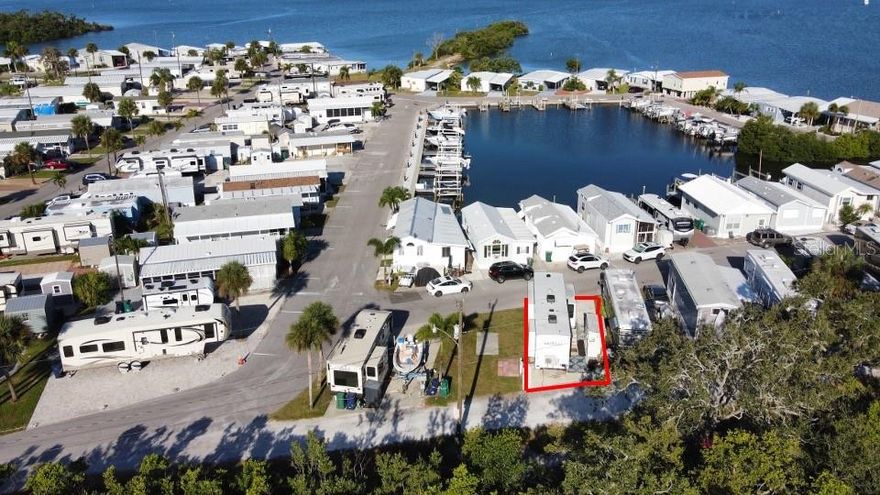 Your RV Lifestyle Awaits! FULL CONCRETE PAD RV LOT and a 10’ x 4’ Tough shed built on site.
Located in Tropic Isles, Palmetto, a 55+ Resident Owned Waterfront community, this lot offers full hookups, easy access, and all the amenities you need to relax and enjoy the good life.  A beautiful 2022 Keystone Retreat 39MKTS in excellent conditions is available for sale for $35,000 as a separate transaction.