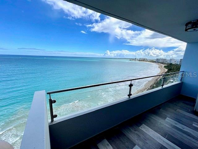 Stunning oceanfront view. Beautiful and modern. Completely remodeled and furnished. 3 bedrooms apartment converted to 2 , 2 bathrooms, kitchen, balcony and very spacious living and dining areas. The apartment has views from every window. Opened kitchen completely remodeled and equipped. Excellent location close to expressway, hotels, supermarket, restaurants among others. Direct access to Beautiful Isla Verde Beach. Building has swimming pool and 24 hours security. One assigned parking space .Disponible agosto 2025