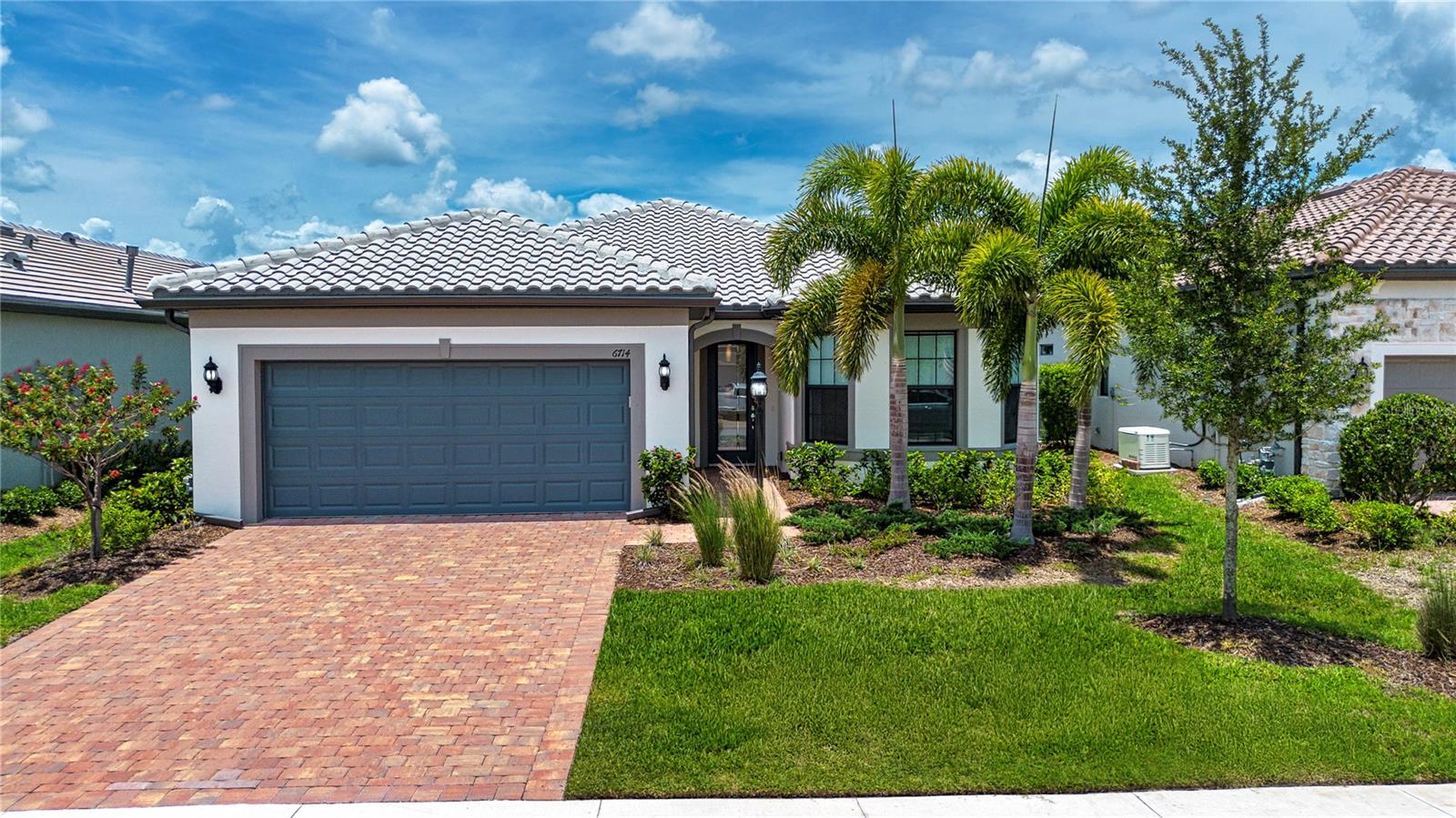 Beautiful Lake View Home in Del Webb Lakewood Ranch – 55+ Active Adult Living!
Welcome to this stunning Mystique floor plan in the highly sought-after Del Webb Lakewood Ranch, a premier 55+ active adult community offering resort-style living at its finest. This spacious home features 3 bedrooms, a dedicated office/den, an extended garage and an open-concept layout perfect for both relaxing and entertaining.
Step inside to find tile floors throughout the main living areas, and enjoy the seamless indoor-outdoor flow with a 90-degree sliding corner door that opens up to a large screened lanai with a Clearview screen—offering peaceful lake views and tranquil Florida breezes. The paver driveway and back patio add to the home’s curb appeal and functionality.
Additional upgrades include window treatments, KitchenAid stainless steel appliances, solid surface countertops, designer lights & ceiling fans, and the home’s prime location within the community makes it easy to walk to Del Webb’s incredible amenities—clubhouse, on-site restaurant, pickleball and tennis courts, resort-style pool, fitness center, and more.
Located within Lakewood Ranch, one of the nation’s top master-planned communities, you’ll have convenient access to shopping, dining, medical services, and the airport.
Don’t miss your chance to live the lifestyle you’ve been waiting for!