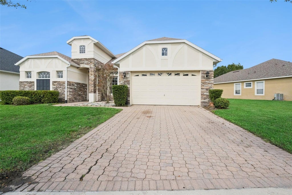 Photo of 16460 Tudor Grove Drive, Orlando, FL 32828 (MLS # O6443138)