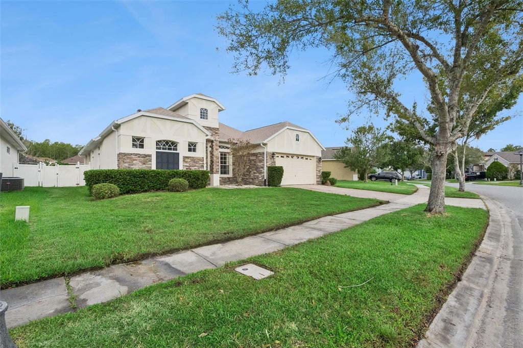 Photo of 16460 Tudor Grove Drive, Orlando, FL 32828 (MLS # O6443138)
