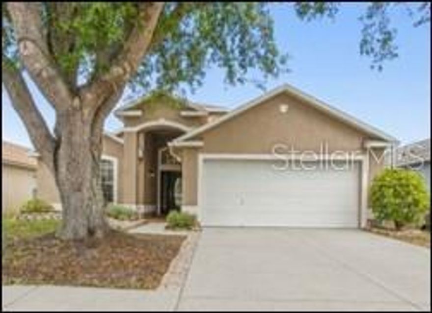 Welcome home to your beautifully updated 3 bed, 2 bath water view home in the desirable Charleston Corners. As you enter the home, you’ll appreciate the completely modern open layout throughout the main living areas. The updated kitchen features granite countertops, hardwood cabinets with soft-close, LG Slate appliances (2019), kitchen island, and wine rack. Beautiful dark laminate wood floors run throughout the home with views of the water from almost every room and an abundance of natural light. The living room also features a new custom electric fireplace with beautiful woodwork, creating a warm and inviting focal point.

The private primary suite offers a slider to the back patio, large walk-in closet, and a brand new en-suite bathroom with frameless shower, updated tiling, and a beautiful double vanity with granite countertops and wood cabinets. The home also features a split bedroom floor plan and an updated guest bathroom (redone 2020).

Step outside and enjoy your outdoor living space featuring a new 2024 extended screened lanai and fully fenced yard, all overlooking a tranquil pond view—perfect for relaxing or entertaining year-round.  Above ground spa makes relaxing in the evening something to look forward to everyday.

Additional upgrades include Roof (2015), NEW Trane A/C (2019), LG Slate Appliances (2019), Updated Bathrooms (2020), new extended lanai patio (2024), and new vinyl fence.

This community offers a large pool, tennis courts, clubhouse, playground, and no flood insurance required. Located near excellent schools, just 15 minutes to the airport, 20 minutes to beautiful beaches, close to major shopping, YMCA, minutes to the Upper Tampa Bay Trail, and convenient to Westchase.

Turn-key and move-in ready—homes like this do not last. Schedule your private showing today and bring your offer!