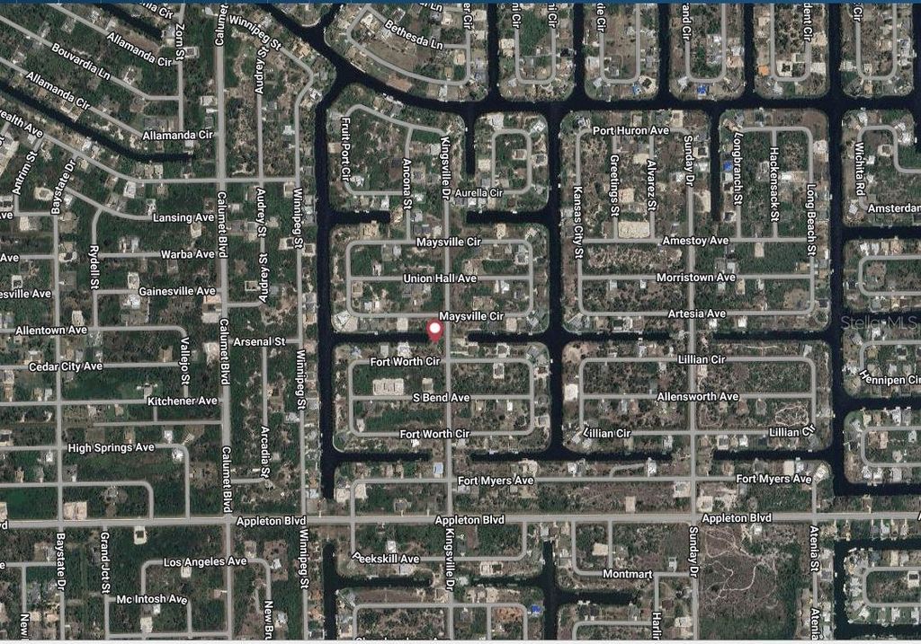 Photo of 10173 Kingsville Drive, Port Charlotte, FL 33981 (MLS # A4660813)