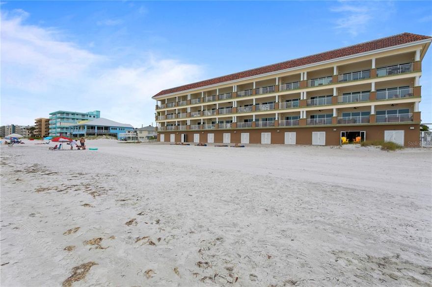 Sea breezes and Sunsets greet you in this stunning three bedroom condo at The Beach Club of Madeira, a quaint collection of 12 upscale condominiums directly on the Gulf of Mexico. With direct waterfront beach views that extend for miles, this exquisite residence, built in 2015, is a true escape that is on the sandy Gulf of Mexico beach. Enjoy the Florida lifestyle with the oversized 42 ft wide balcony with breathtaking views of the Gulf, which are also enjoyed from the Great Room with 6 slider doors and the main Bedroom with triple slider doors. New Flooring throughout the great room, kitchen, foyer, hallway, and dining room (2022), New kitchen chandelier and pendants (2022), New interior painting (2021), and New owners suite bedroom flooring (2021).  Each day will feel like a vacation as you enjoy an oversized GREAT ROOM with a Chef's kitchen with stainless steel appliances and huge island, offering you space to entertain large or intimate groups while still enjoying views from every direction! All bedrooms offer ENSUITE bathrooms for guests and family to enjoy this ultimate residence with you. One of the most coveted features of the home, is your own PRIVATE BEACH CABANA, with double doors that open directly on to the sandy Gulf beach! Accessed through your private garage, the cabana is customized to enjoy Florida breezes, sunrises and sunsets, with the conveniences of a mini-kitchen at your disposal. Located on the third floor, and directly across from the elevator, you’ll enjoy the conveniences of beach living. A rare opportunity to live at this sought after boutique community with controlled access lobby, community pool, and a quiet beach location that is close to restaurants, entertainment venues, shopping, Tampa International and St. Petersburg Airports, and downtown St. Petersburg, Sarasota, and Tampa! Call today to make your appointment to see this showcase condo with rare unobstructed views of the Gulf of Mexico! Room Feature: Linen Closet In Bath (Bedroom 3).