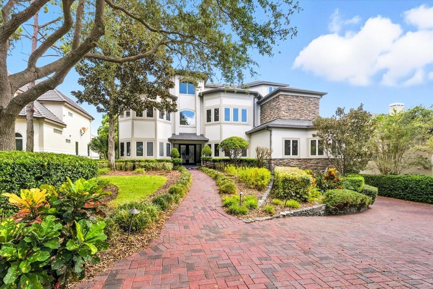 A SITE TO BEHOLD! This breathtaking 5-bedroom, 7.5-bathroom estate offers over 9,100 heated square feet of luxury living and is perfectly positioned on a quiet cul-de-sac overlooking the 12th tee of the prestigious Island Course. Designed and built with meticulous care, this home is truly one-of-a-kind. The entire fourth floor is dedicated to a stunning master retreat with an elevated platform, expansive bath, and spa-like privacy. The home also features a grand billiards room, custom home theater, full gym, 10-person sauna, 8-person steam room, reading/card room, office, and a true basement with a 3-car garage and built-in panic room. Outside, enjoy your own private tropical oasis with a saltwater pool, spa, and fountain—all framed by lush landscaping and sweeping golf course views.

Located within the highly sought-after Innisbrook Resort and Golf Club, this gated 900-acre community is known for its four championship golf courses, including the famed Copperhead Course—home of the PGA TOUR’s Valspar Championship. Resort amenities include tennis courts, a full-service spa, fine and casual dining, multiple resort pools including the Loch Ness Monster Pool, and miles of trails surrounded by serene natural beauty. Innisbrook offers the ultimate blend of luxury, recreation, and security—making it one of Florida’s premier residential destinations. This home is a rare opportunity to live in one of the most iconic golf and lifestyle communities in the country.