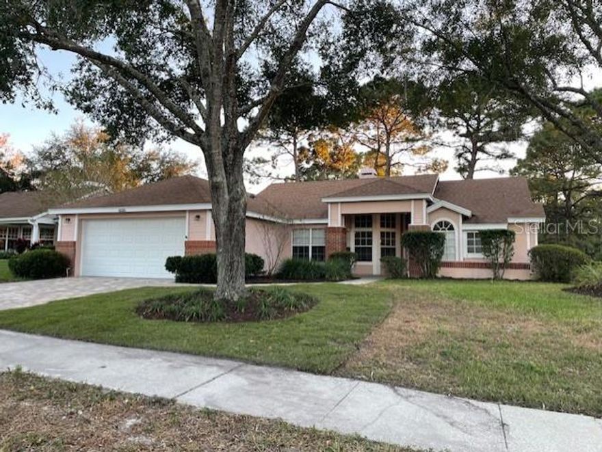 Recently Remodeled 3 Bedroom, 2 Bath Home on Corner Lot with High Ceilings, Screen Porch, Double Car Garage, Inside Laundry Room, Split Bedroom Plan, Family Room with Fireplace and More. Newer Cabinets, Appliances, Flooring, Shower Tile, Fixtures, and More! All Appliances Including Washer & Dryer in Unit.