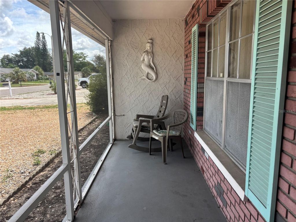 Photo of 7406 Bougenville Drive, Port Richey, FL 34668 (MLS # G5112829)
