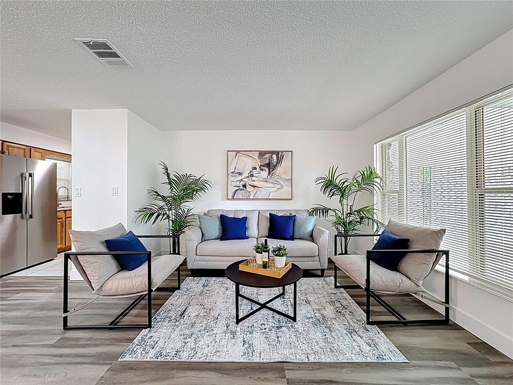 Photo of 116 Exeter Avenue, Longwood, FL 32750 (MLS # O6371034)