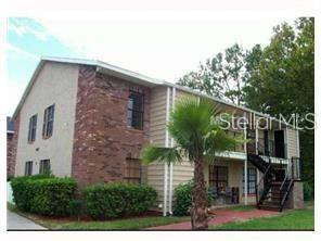 Charming, updated ground floor condo in the heart of Land o' Lakes! Offering a spacious and low maintenance lifestyle, this unit features newer carpet, appliances lots of room to make it your own! Located in an excellent area, you'll enjoy the convenience of being just minutes from Tampa Premium Outlets, shopping, dining, and entertainment options. The community boasts a sparkling pool, and beautifully maintained grounds giving a hassle-free experience. If you're looking for a cozy home, this condo delivers comfort, convenience and charm.