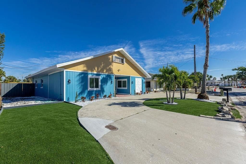 Photo of 14019 W Parsley Drive, Madeira Beach, FL 33708 (MLS # TB8483237)