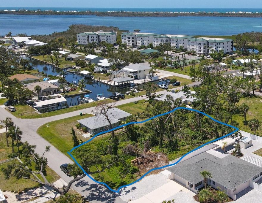 Build your dream home in a location that truly captures the essence of Florida's coastal lifestyle. This prime lot, nestled in a quiet little enclave near the sparking waters of Lemon Bay and just minutes from the Gulf, offers endless opportunities for nearby boating, fishing and enjoying breathtaking sunsets. Imagine being only a short drive from the pristine beaches of Manasota Key and Boca Grande, local waterfront restaurants, and premier golf courses-everything you need for relaxation and recreation is right at your doorstep. Whether you're envisioning a full-time residence or seasonal getaway, this property provides the perfect foundation for the lifestyle you've always wanted. No HOA or Deed restrictions. Nearby boat slips are often available to purchase or lease and provide quick access by boat to the intercoastal & Gulf with the freedom to traverse either whenever the whim hits. Views of the Canal and Intercoastal may be possible with buildup.