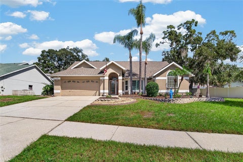 Photo of 2010 River Park Court, Valrico, FL 33596 (MLS # TB8550249)