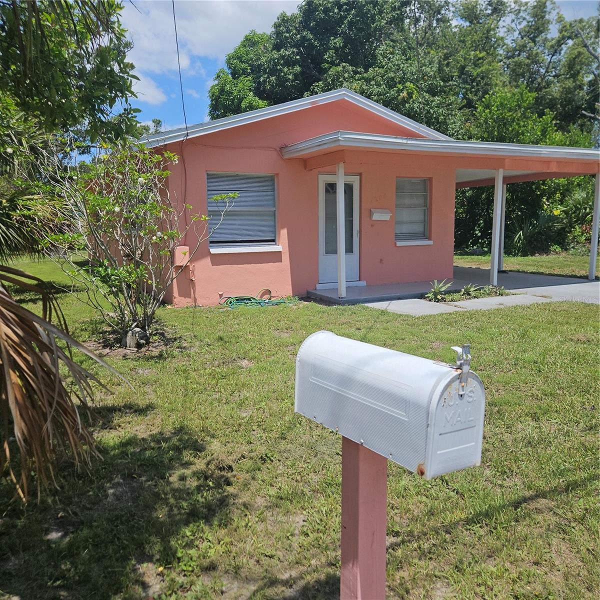 This adorable 2 bedroom 1 bath home is located on a large lot and has a carport. There is a laundry room that is separate from the home in the carport and has a washer and dryer. The bedrooms are located in the back of the home with the Living Room/Dining Room in the front of the home. The flooring is tile. The kitchen has a Refrigerator and Gas Oven. The water heater is also gas. Tenant is responsible for utilities. First, Last and Security required.