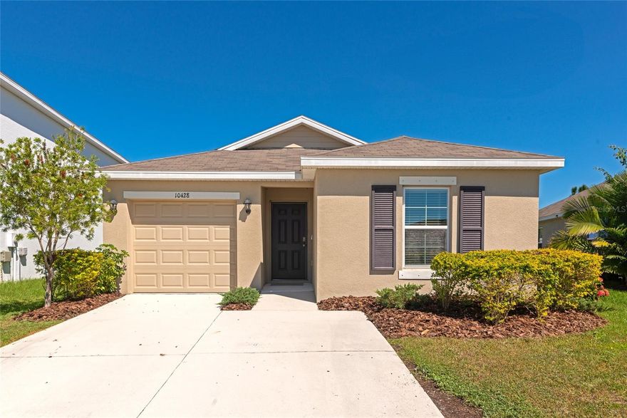 Modern comfort meets cozy in this charming 3 bedroom, 2 bathroom home - This practically brand new home is perfectly sized and an ideal blend of low-maintenance living and contemporary style. Step into a thoughtfully designed split floor plan featuring two generously sized guest bedrooms and a shared full bathroom. Continue down the hall to discover a spacious, open-concept kitchen and living area that is perfect for entertaining or relaxing at home.  The kitchen features beautiful stainless steel appliances, granite counters and white shaker cabinets.  The primary bedroom, located in the rear of the home, is a perfect owner's retreat, featuring an en-suite bathroom and walk-in closet.  The backyard is a blank canvas but can be fenced in and created into a picturesque backyard oasis.  You'll also be impressed by the solar panels which significantly keep the energy bill low! Block construction and hurricane shutters are also a nice feature when the weather is unpredictable or stormy, offering extra peace of mind during hurricane season.  You'll find this beautiful home situated in Bella Lago, an amenity rich community with low HOA's.  The clubhouse, community pool, dog park and green space are just across the street - adding to your new convenient lifestyle. Love what you see? Let's make it real - Schedule your Showing Today!