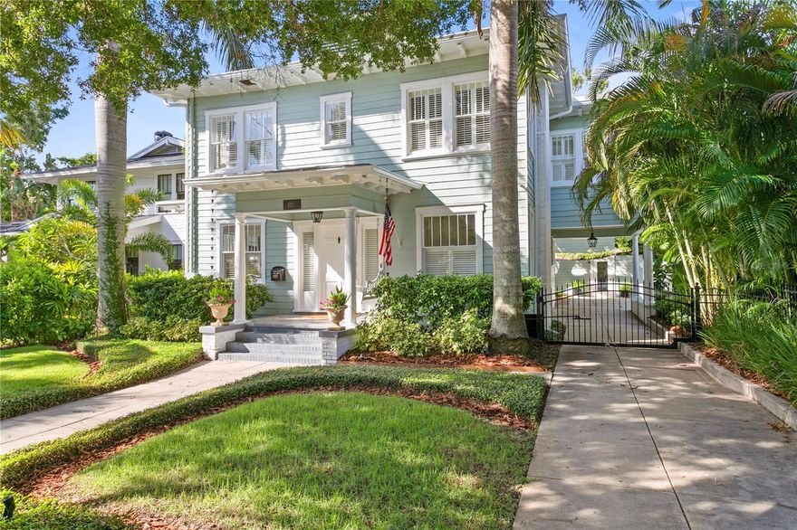 Beautiful Hyde Park estate with a blend of an updated and modern floor plan and all of the historic charm of a classic Hyde Park home. The property features a pool house, guest house, and storage building on private lot just steps from Bayshore Boulevard and Hyde Park Village! You will find hardwood floors and stunning millwork throughout the home. The kitchen features a breakfast bar, pantry and high-end appliances including a Viking range. The kitchen opens to a dining area with built-in buffet. Ample natural light streams into the living room which features a fireplace with gas insert and wall-to-wall windows with plantation shutters and leads to the family room with built-in entertainment center. Upstairs, the master bedroom features a vaulted ceiling, large custom walk-in closet, remodeled bathroom with dual sinks and separate sitting room/den. The other two second floor bedrooms share a Jack and Jill bath. The separate guest house features a first floor living room with kitchenette and laundry and upstairs a bedroom with vaulted ceiling and full bath. The pool house is perfect as an entertainment room or home gym and has a half bathroom. This fabulous home is perfect for entertaining with a large covered lanai with outdoor kitchen and gorgeous pool with brick patio surround. Other features of this elegant home include convenient second floor laundry, large storage building, circular drive, fenced and gated yard and a new roof in 2023 and new water heaters in 2022.