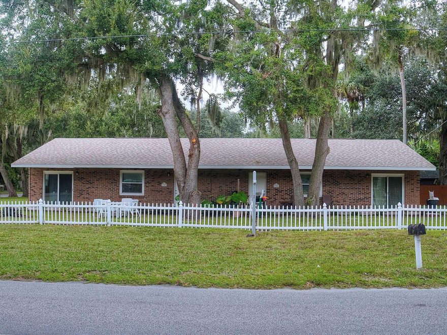 Investor Alert! This adorable duplex has 2 bedrooms 1 bath per side and sits atop a lovely corner lot conveniently located in the residential subdivision of Florida Shores. Both sides are currently rented so this property offers an excellent opportunity to generate immediate income. Features include tile floors, inside laundry a covered patio and all wrapped up with an idyllic picket fence around most of the large yard. Total price includes both sides of the duplex.