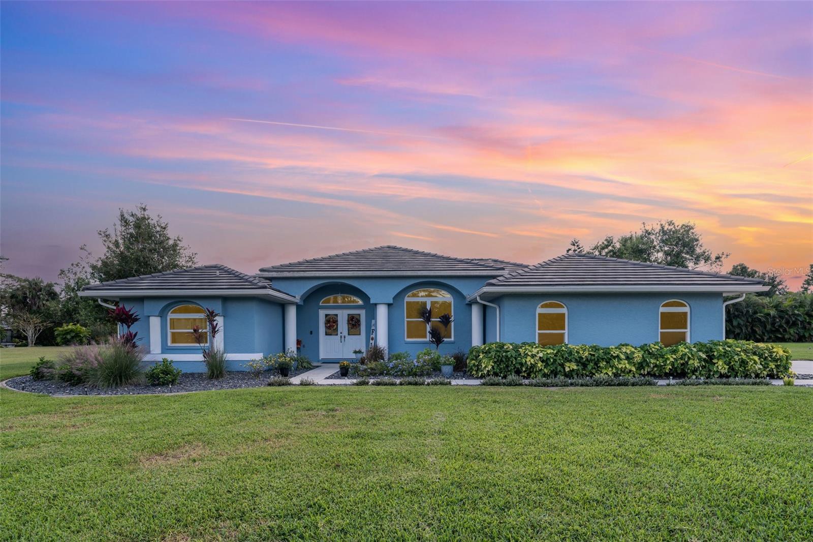 Exceptional 4-Bedroom, 3-Bathroom Home with Pool & Expansive Lanai in North Port Country Club Estates — Flood Zone X!
Welcome to this beautifully upgraded 4-bedroom, 3-bathroom home located in the highly sought-after North Port Country Club Estates, just minutes from the prestigious Heron Creek Golf Course. Situated in FEMA-designated Flood Zone X, no flood insurance is required, providing added peace of mind and long-term savings for the future homeowner.
Set on an oversized lot of nearly half an acre, this home blends comfort, luxury, and functionality. Step inside to a bright, open floor plan featuring a fully upgraded kitchen with under-cabinet lighting—perfect for creating gourmet meals. The spacious living areas flow seamlessly onto the expansive, extended lanai with pool access from the master bedroom, guest bedroom, family room, living room, and kitchen. It’s the ideal layout for indoor-outdoor Florida living and effortless entertaining.
Perfect for multi-generational living or guests, the home offers privacy with pocket doors leading to a separate wing of bedrooms and bathrooms. Recent upgrades include a new tile roof (2021), new A/C (2024), and new water heater (2023). You'll also find impact-resistant windows and doors throughout, a hurricane-rated garage, and clear hurricane shutters and fabric panels for added storm protection.
Additional features include a spacious side-entry garage, a separate storage room off the lanai, and meticulously maintained landscaping. Country Club Estates is a quiet, deed-restricted community with an optional annual membership fee of just $25.
Homes this beautiful, in this location, and in Flood Zone X rarely last long — schedule your private showing today and make this move-in ready gem yours before it's gone!