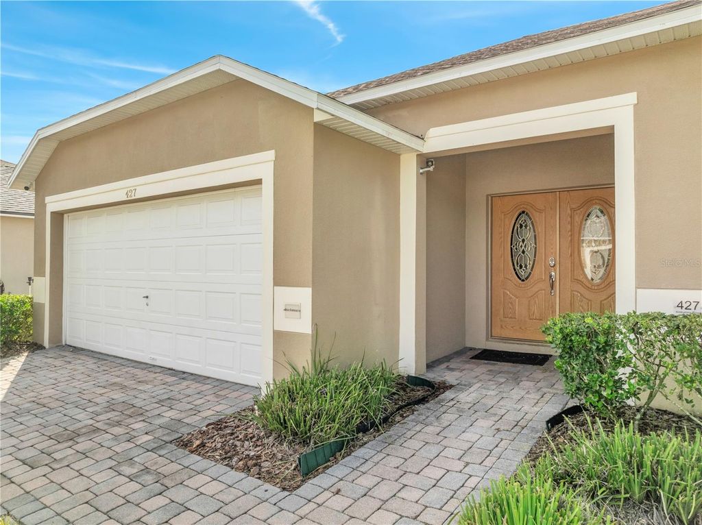 Photo of 427 Kildrummy Drive, Davenport, FL 33896 (MLS # O6345041)