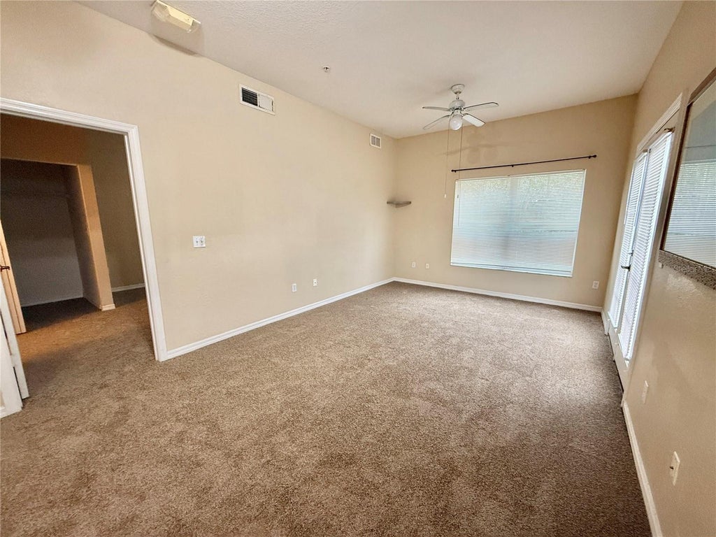 Photo of 2221 San Vittorino Circle #107, Kissimmee, FL 34741 (MLS # S5159042)
