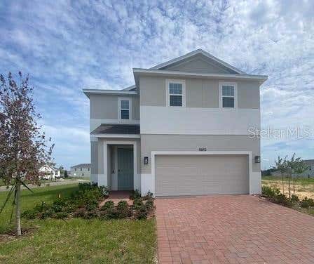 Photo of 27329 African Fish Court, Howey In The Hills, FL 34737 (MLS # O6404356)