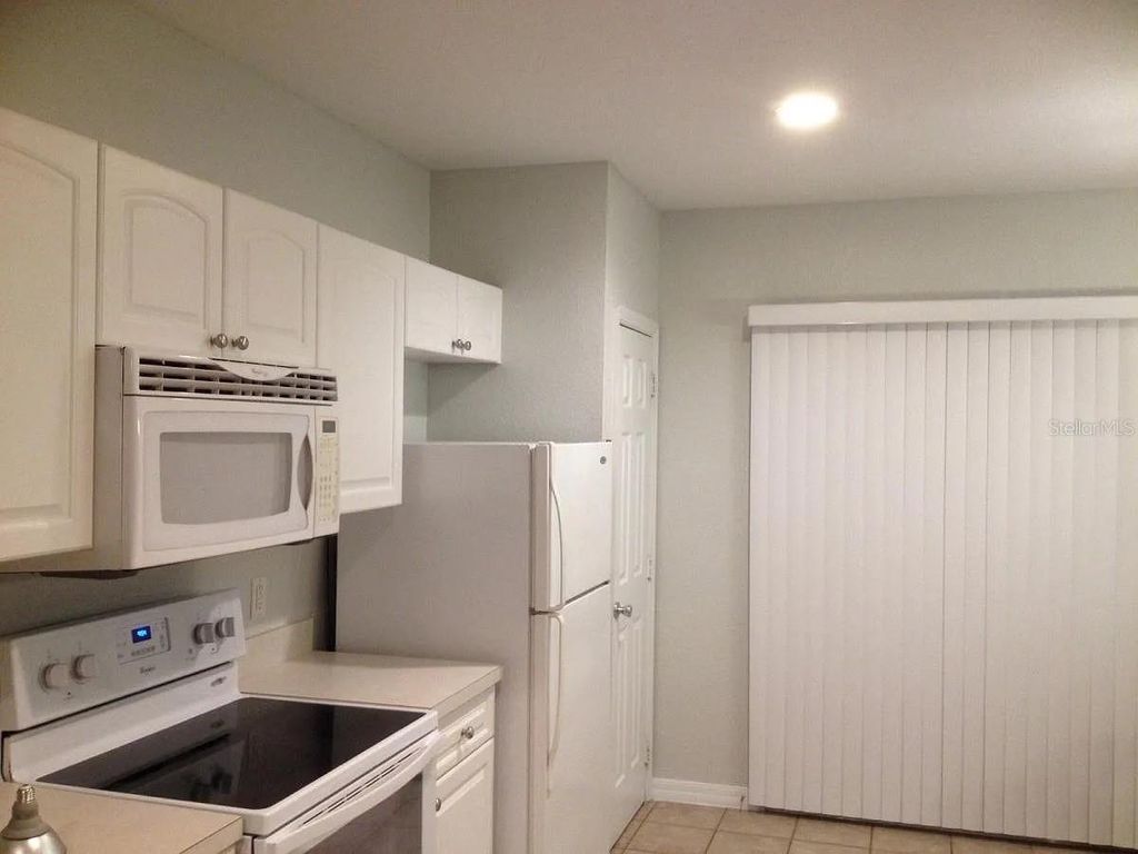 Photo of 4204 Plantation Cove Drive, Orlando, FL 32810 (MLS # O6383671)