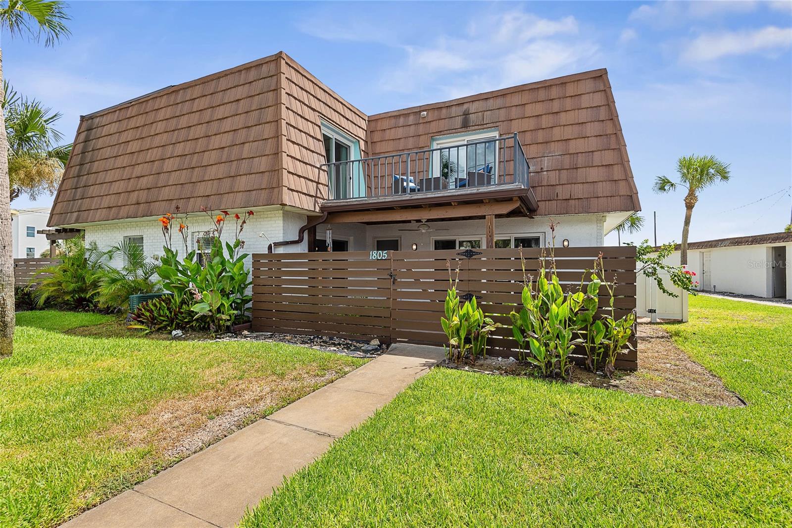 Welcome to this beautifully maintained fully furnished 2-bedroom, 2-bath home just one block from the beach. This charming residence offers the perfect blend of comfort, style, and location, making it ideal for anyone who wants to enjoy Flagler’s laid-back coastal lifestyle without the hassle of moving furniture. Step inside to find an open and airy floor plan filled with natural light. The spacious living area flows seamlessly into the kitchen and dining space, perfect for entertaining or relaxing after a day at the beach. The kitchen features modern appliances, ample cabinet space, and a breakfast bar for casual dining. Both bedrooms are generously sized, with access to your second floor balcony. Enjoy ocean breezes and breathtaking sunsets year round! Enter the home through your private courtyard—great for outdoor dining, gardening, or simply soaking up the Florida sunshine. From bedding to silverware, no need to bring anything put your closet! Start living the Flagler Lifestyle today!