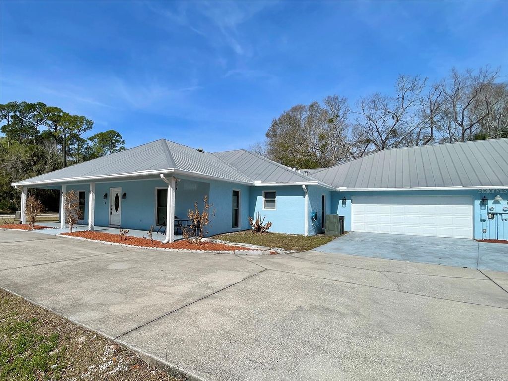 Photo of 945 Mcdonald Road, Port Orange, FL 32129 (MLS # V4947511)