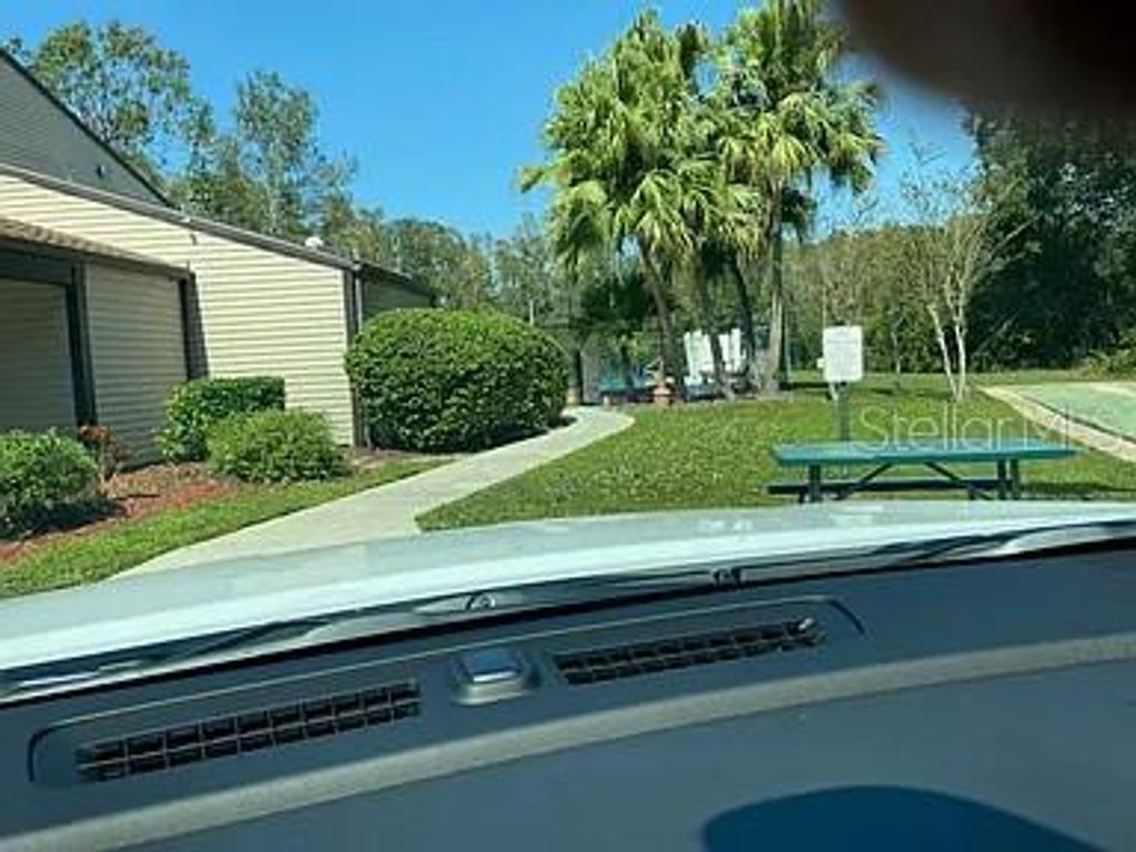 Photo of 12065 Proctor Loop #7, New Port Richey, FL 34654 (MLS # TB8457086)