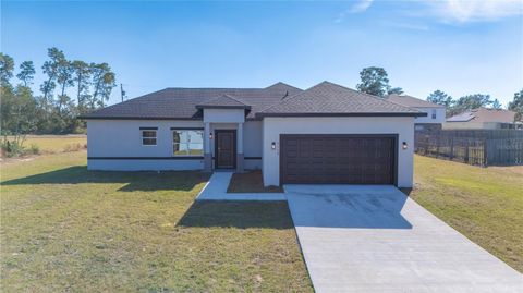 Photo of 3110 SW 127th Lane Road, Ocala, FL 34473 (MLS # OM714308)