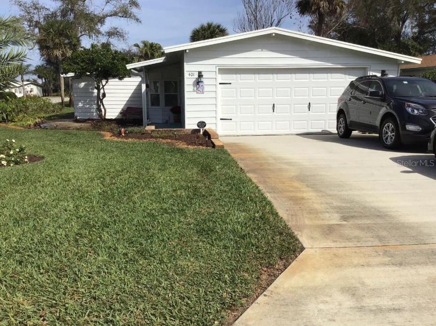 3 BEDROOM WITH LARGE 2 CAR GARAGE.  One room could be a 4th bedroom (no closet).  The cook will love the remodeled kitchen with loads of cabinets and large pantry  Master bathroom has his and her closets.  Waterproof plank flooring throughout the entire home.  Small porch on the side.  Many extras. On a large landscaped lot.  New roof being installed this week.  Don't miss this one!  Riverfront Edgewater Landing has SO many amenities include private boat ramp, fitness center, woodshop, heated pool and screened hot tub, 1 mile riverwalk, intracoastal fishing pier, tennis, pickleball, bocci, horseshoes, shuffleboard, entertainment committee, pool tables.  Resort living every day.  Edgewater Landing has received awards.  You own the land.  Dues include cable, internet and outside storage for either a boat or RV (when available). ;Water: City