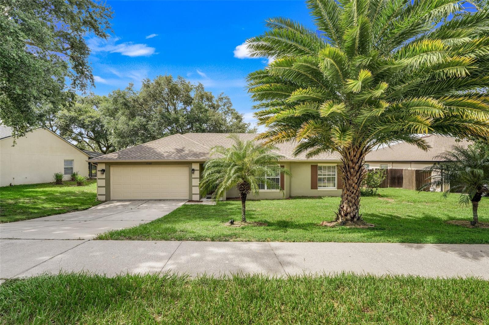 Welcome to this cozy, well-maintained 3-bedroom, 2-bathroom home in the desirable Crane’s Landing neighborhood. With 1,322 sq. ft. of living space, this block-constructed home offers a practical split floor plan, warm wood floors throughout, and an inviting dining area next to the upgraded kitchen. The kitchen features custom cabinets and level 4 granite countertops, blending style and functionality for everyday living or entertaining.
Step outside to a large private backyard overlooking a peaceful pond — no rear neighbors means extra privacy and an open view. A custom guest shower adds a thoughtful upgrade inside.
Conveniently located near South Lake High School and close to the new Hiawatha Reserve Park for outdoor recreation. You’re just 7 miles from the Florida Turnpike for an easy drive to Orlando. Spend the day at Walt Disney World — about 35 minutes away — or catch your flight at Orlando International Airport (MCO) in roughly 45 minutes. Shopping, dining, and everyday essentials are nearby in Clermont, with Clermont Landing shopping center about 15 minutes away.
Perfect for first-time buyers or anyone seeking a comfortable home with modern upgrades in a great spot.