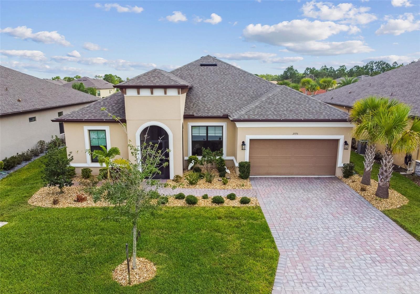 Sought after VERSILIA subdivision in Solivita, within walking distance to the Village Center. BETTER than NEW, this home was built in 2022 with extensive upgrades throughout the home & professional exterior Landscaping. Walk inside the screened front porch which leads you to an elegant LEADED front glass door. Enter the FOYER to this uniquely designed LETIZIA model, which offers 3 separate sleeping areas, each wing with it's own bathroom for privacy & convenience. Seller has made extensive upgrades including Mohawk engineered luxury flooring throughout main living areas & bedrooms/study have plush carpeting. The FOYER, DINING & GREAT room afford TRAY ceilings with CROWN MOLDING inlay. The GOURMET Kitchen features a large QUARTZ Island with built in sink, seating for 4 & storage below. Centered in this Kitchen is a beautifully appointed Stainless Steel Range HOOD over cooktop. The OVEN & MICROWAVE combo are built into the cabinets. Tiled backsplash, accent lighting & good sized WALK-IN Pantry. The kitchen cabinets afford oversized DRAWS, this allows easy storage for your pots & pans. Enjoy this OPEN FLOOR PLAN for entertaining family & friends. The PRIMARY Suite offers plush carpeting with room darkening shades. The En-Suite Bathroom has a generous sized Walk-in CLOSET, also a Walk-in SHOWER with a built-in bench & seamless GLASS Shower Door. Second Hall Bathroom has a Tub-Shower combo & the Third Hall bathroom affords a Walk-in Shower. This home is naturally bright with it's neutral paint color throughout. Sit back & enjoy your morning coffee in your private SCREENED LANAI overlooking a peaceful greenbelt & enjoy the Pond view from your backyard. Laundry room with full sized Washer Dryer & ample cabinets for storage. The Two Car garage is equipped with an UPGRADED outlet to charge your Electric Vehicle. Come view & buy this home today.
Solivita is an active adult 55+ community located in Kissimmee, Florida. It is approximately 50 minutes from Disney World & the Orlando International Airport. Solivita has a total of 5,470 homes. Approximately 7500-10,000 people live in Solivita (not all year round). Amenities include: - a manicured SOFTBALL diamond & field - 36 holes of CHAMPIONSHIP GOLF that can be played by joining the Stonegate Golf Club or paying as you go - 2 STATE of the Art AMENITY centers with updated exercise equipment, yoga studio & meeting rooms - 3 restaurants - 14 HEATED POOLS - 17 PICKLEBALL courts - 9 TENNIS courts - 4 BOCCE BALL courts - 4 SHUFFLEBOARD courts - 3 HORSESHOE pits - a BILLIARDS room - miles of bike paths - 2 DOG PARKS (Small & Large Dogs) - Corn Hole - Tot Lot PLAYGROUND - COMMUNITY GARDEN - over 250 resident clubs. The HOA: - maintains the LANDSCAPING & IRRIGATION systems in the common areas as well as at individual homesites - maintains the roads throughout the community - PROVIDES SECURITY with gate guards and mobile patrols including the Polk County Sheriff - allows AUTOMATED GATE ACCESS for residents via license plate readers - provides residents with Fiber Optic Internet & TV service. NEW MAJOR SHOPPING CENTER opened directly across from the Solivita it features Sprouts Grocery, TJ MAXX, Ross, Burlington, Rack Room Shoes, 5 Below, Ulta, Outback, First Watch, 5 Guys, Urgent Care, Dentist, TD Bank, Petco & Hair Cuttery & MORE TO COME.***
