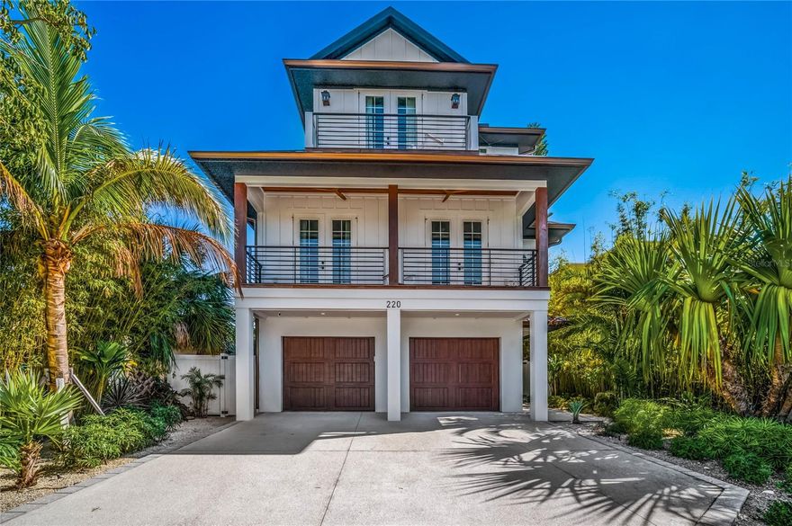 Stunning 3 level 6 bedroom Lido Key Coastal Home being offered turn-key with an abundance of amenities and comforts for a rental-ready investment or beach-ready getaway. Perfect for gathering large groups of family and friends. The property is the epitome of luxury real estate and was designed with high-end finishes and modern amenities to provide the ultimate comfort and relaxation. Elevator service from ground to upper floors. The chef's kitchen is equipped with top-of-the-line stainless appliances, 2 built-in ovens, abundance of cabinets, ample counter space, and everything needed to prepare gourmet meals. Each bedroom offers a full on-suite bathroom.  And all but the children’s bunk room have balcony access for beautiful gulf, beach, and downtown Lido and Sarasota views.  The bathrooms are beautifully designed, featuring the latest in high-end fixtures, finishes, and amenities, providing a spa-like experience. Loft area on 2nd floor with a full bath and pull-out sofa can serve as an additional bedroom. The 3rd level balcony accesses a rooftop deck with breathtaking views of Lido Key, the Gulf of Mexico, and Downtown Sarasota.  Perfect for savoring the island scenery and sunsets. Step outside and you'll find yourself surrounded by luxury amenities, featuring a large covered patio with outdoor television. Lush tropical landscaping surrounds the patio, pool and spa, providing privacy and island ambiance.  And the pool is equipped for relaxation, conversation and festivities, featuring underwater barstools, a sun shelf and a water slide.  Just off of the pool area, you'll find additional seating, dining, and gaming areas including foosball and ping pong and darts. Beach chairs, games and bikes included to start enjoying Florida vacation living. Located just a stone's throw from the beach, this property offers the best of both worlds - a luxurious retreat for relaxation and a perfect jumping-off point for all the area has to offer. With both the serenity of the beach and the action of St. Armand’s Circle within walking distance, this property offers supreme convenience to some of Sarasota’s most iconic and alluring locales.