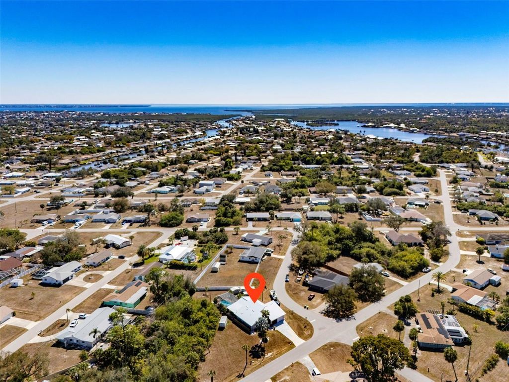 Photo of 643 Blue Lane NW, Port Charlotte, FL 33952 (MLS # C7522705)