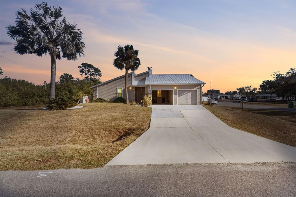 Photo of 643 Blue Lane NW, Port Charlotte, FL 33952 (MLS # C7522705)