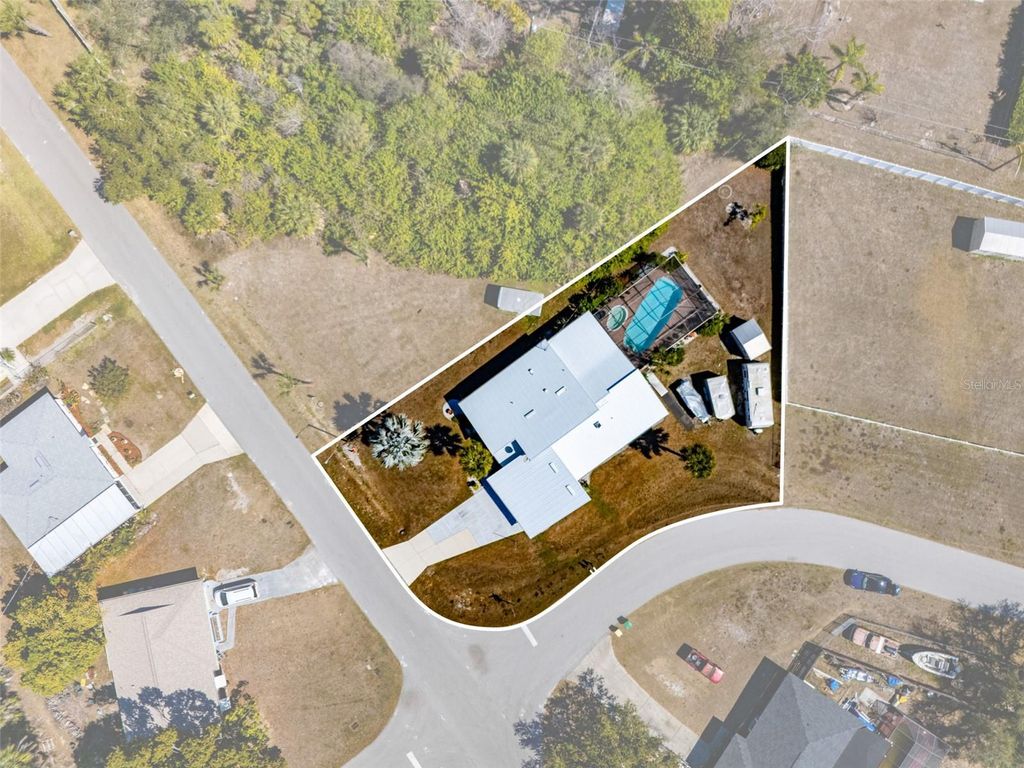 Photo of 643 Blue Lane NW, Port Charlotte, FL 33952 (MLS # C7522705)