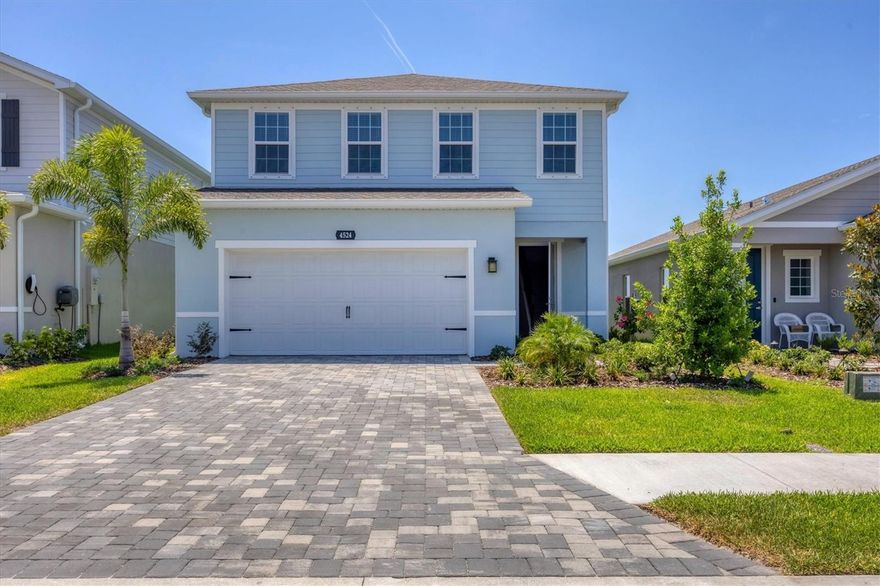 One or more photo(s) has been virtually staged. Short Sale. Welcome to Avalon Woods, where luxury and comfort combine to create your dream home! Step into the exquisite, brand-new Windemere model by Ryan Homes, filled with high-end upgrades and waiting for you to call it home. As you walk through the spacious foyer, you'll be captivated by the expansive living area, complete with stunning lake views that will take your breath away. For those who love to cook, the kitchen is a chef's dream, showcasing quartz countertops, a chic tile backsplash, an oversized island with under-cabinet lighting, and ample cabinet space, plus a generous pantry designed for both style and functionality. Envision yourself unwinding in your peaceful lanai, where panoramic screens allow you to enjoy the serene sights of a tranquil pond and a picturesque nature preserve. With the added convenience of a first-floor bedroom and a full bath—featuring elegant quartz countertops, ceramic tile, and a luxurious walk-in shower—this home is designed for your comfort and convenience. Ascend to the second floor to find a versatile loft space that can be tailored to fit your lifestyle—transform it into a game room or a cozy second living area. The owner's retreat is a true sanctuary, complete with double closets and a lavish ensuite bath that offers dual sinks, quartz countertops, ceramic tile, and a spacious walk-in shower. Additionally, with three more well-appointed bedrooms upstairs and a third full bath with double sinks and a tub/shower combination, there’s ample room for family and guests. You’ll also appreciate the attached two-car garage, featuring a new epoxy floor backed by an impressive 20-year warranty! Experience the joy of a new home without the burden of unexpected costs or long waiting periods. Is this the dream home you’ve been searching for? Schedule your showing today and make it yours before it’s gone!