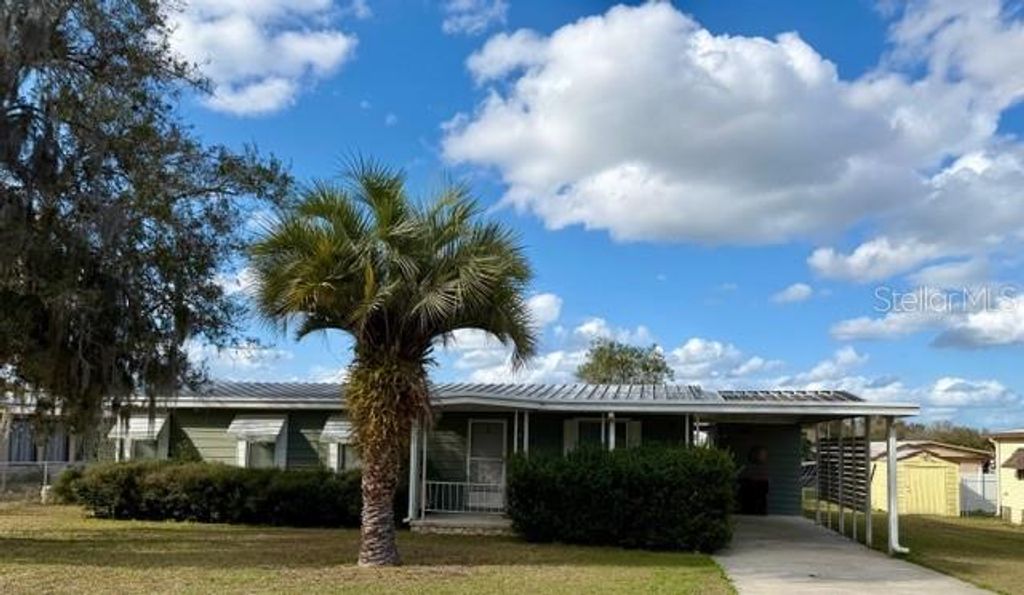 Photo of 6571 NE 1st Place, Ocala, FL 34470 (MLS # OM721243)