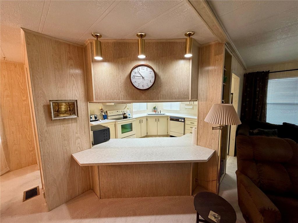 Photo of 6571 NE 1st Place, Ocala, FL 34470 (MLS # OM721243)