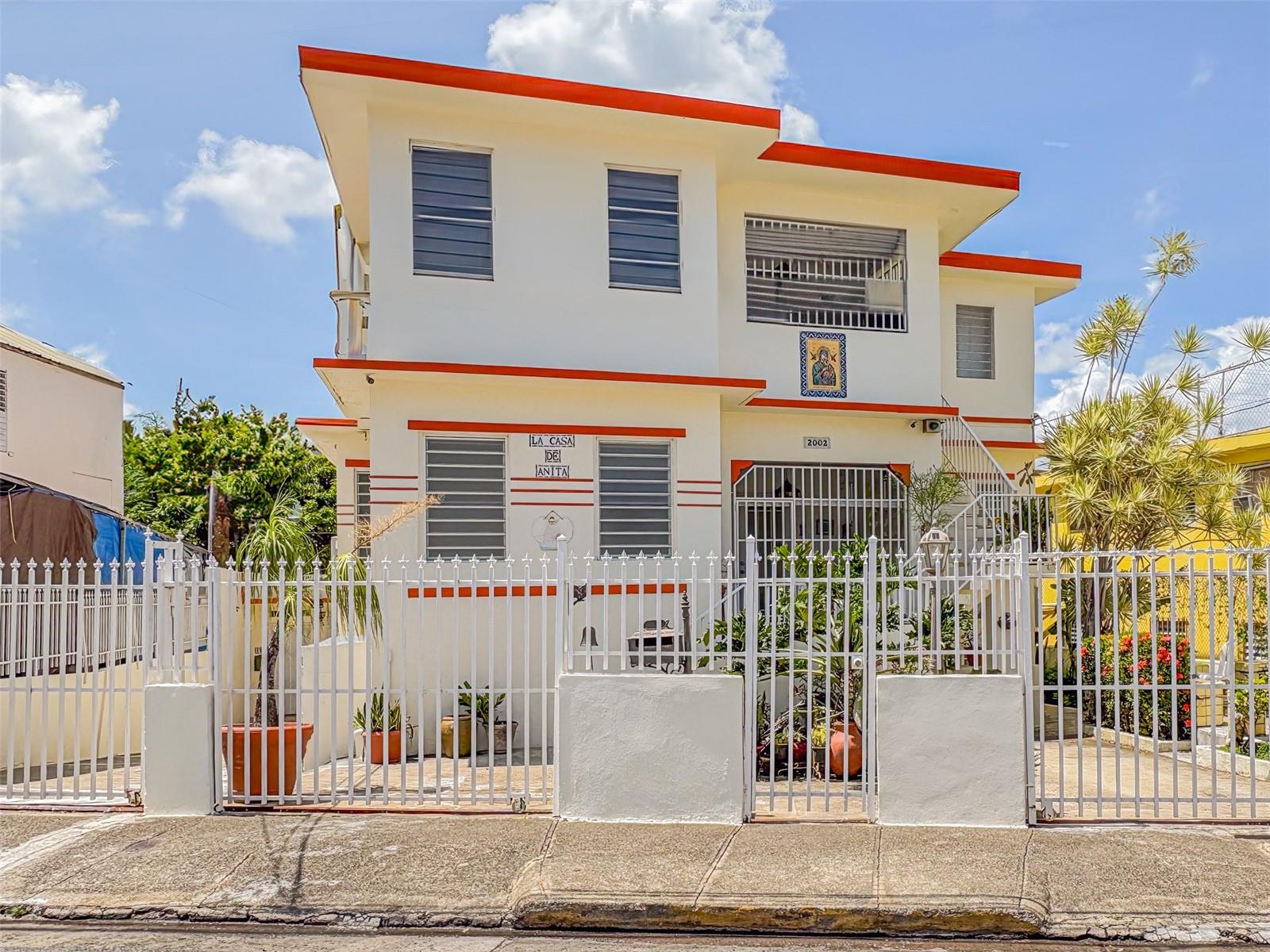 This 3-bedroom, 2-bathroom apartment, located on the first floor of a well-maintained multifamily home with 5 units, offers generous and well-distributed spaces. The living-dining area seamlessly connects with the comfortable kitchen, which leads directly to the back terrace and laundry area. The master bedroom includes a walk-in closet and a jacuzzi, providing the perfect retreat after a long day. Located in a peaceful, family-oriented community, this apartment includes air conditioning units in each room, a fully equipped kitchen, and a completely equipped laundry area. The apartment comes with an assigned parking space and access to well-maintained common areas. No pets are allowed, ensuring a quiet and respectful environment for all residents.The location is unbeatable: just minutes from Avenida Ponce de León, the heart of the trendiest area in Santurce, with a wide selection of gastronomy, urban art, and a vibrant cultural scene. Plus, Sagrado Corazón University and the Tren Urbano station are nearby, providing quick access to all of San Juan.