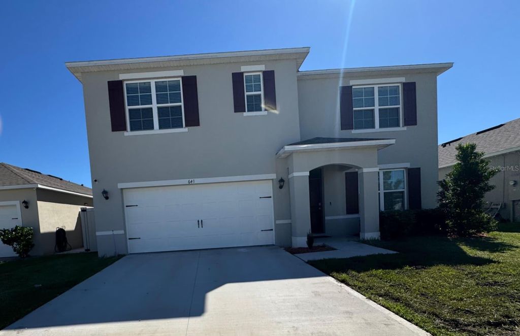 Photo of 641 Talisi Loop, Saint Cloud, FL 34771 (MLS # O6352177)
