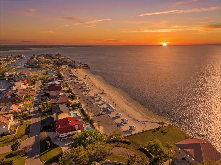 Welcome to waterfront living at its finest in the hidden gem of Flor-a-mar. Situated on an expansive .28-acre lot with direct, unobstructed access to the Gulf, this 3-bedroom, 2-bath residence offers the perfect blend of comfort, space, and true boating lifestyle. One of the most unique features of this property is access to a private beach for only two hundred annually—with no homeowners association—giving you the best of both worlds: exclusive coastal access without restrictive fees or rules. Step inside to a thoughtfully designed layout featuring a welcoming living area and a spacious primary suite with generous closet space and a well-appointed ensuite bath. The kitchen is ideal for both everyday living and entertaining, complete with upgraded cabinetry, granite countertops, and serene views overlooking the pool and waterway. A charming Florida room with a wood-burning fireplace adds warmth and versatility, creating the perfect setting for relaxing evenings. The additional bedrooms are well-sized and share a full bath, offering comfort for family and guests. Recent improvements within the past three years include fresh exterior paint, a water softener system, lanai re-screening, updated gutters, fascia and soffits, pool heater replacement, and a reinforced seawall with a dead man anchoring system. Outdoors is where this property truly shines. Enjoy a large pool, an expansive fenced yard, and plenty of room for all of your toys—including space for an RV, work truck, or boat trailer. The brand-new 16,000 lb boat lift, new seawall cap, and additional platform for kayaks, paddle boards, or fishing make this a true waterfront enthusiast’s dream. Flor-a-mar is a hidden treasure along the Gulf Coast, known for its relaxed coastal feel, boating-friendly canals, and easy access to open water. Whether you are heading out for a day on the Gulf, enjoying sunset views, or simply embracing the Florida lifestyle, this home offers a rare opportunity to live exactly how you’ve always envisioned.