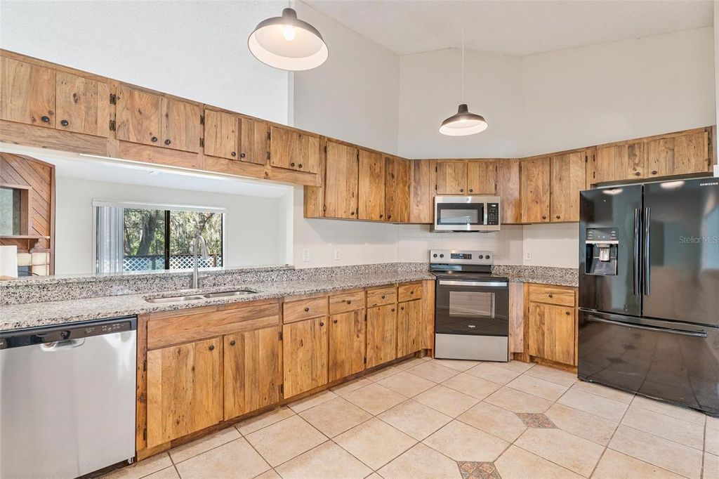 Photo of 36035 E Spring Lake Boulevard, Fruitland Park, FL 34731 (MLS # G5108671)