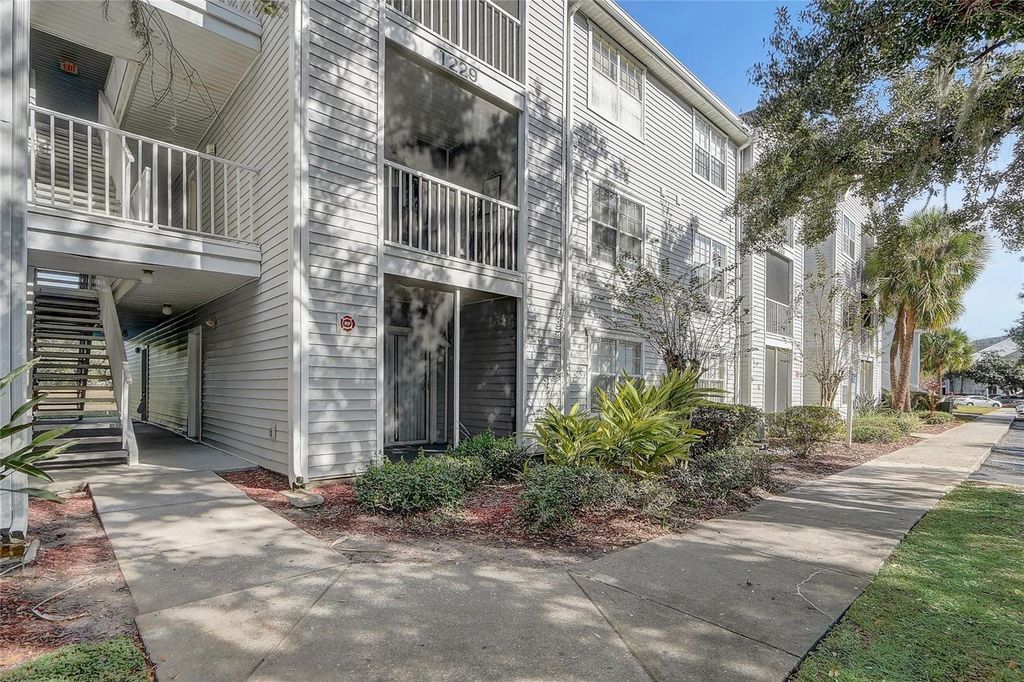 Photo of 1229 Bermuda Lakes Lane #202, Kissimmee, FL 34741 (MLS # O6419003)