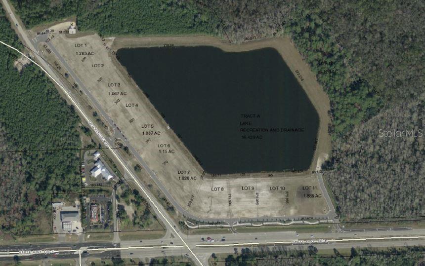 Exceptional pad ready retail site a the intersection of Old Kings Road and SR 100. Kings Pointe Development is a beautifully landscaped ( large lake in the center of property) commercial subdivision on the prime east/west corridor in Palm Coast. This location is just 100 yards from I-95 interchange and is subdivided into 12 prime retail lots. Great drive by visibility with the added feature of a private frontage road offering access from both SR 100 and Old Kings. Please see flyer for detailed demographic information.
