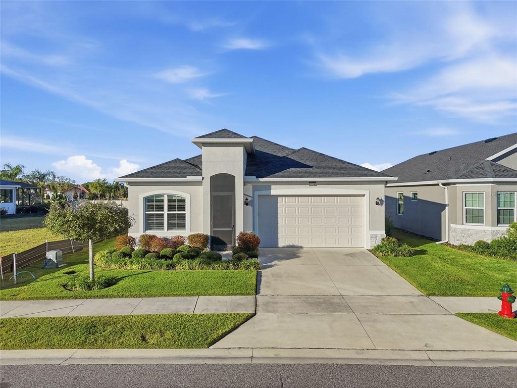 Photo of 2154 Wallingford Loop, Mount Dora, FL 32757 (MLS # O6372764)