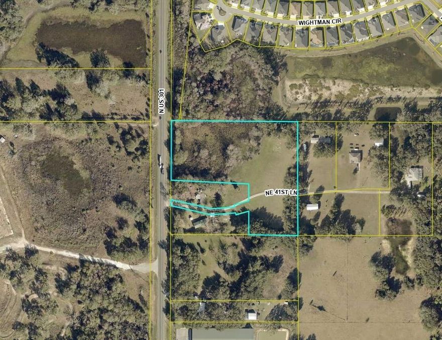 This 6.5 acres with 330' frontage on US Hwy 301 could provide your next opportunity to build/develop on this busy highway between Wildwood and Coleman. This property is contiguous to The Villages and a great place to serve that population...and most of Sumter County conveniently. Currently in the County, the City of Wildwood staff would be favorable to annexation and zoning change, providing City water to the site. Approximately 2.5 acres in the NW corner of the site is in flood zone A.