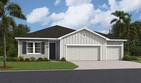 Photo of 63 Ponce Preserve Drive, Palm Coast, FL 32164 (MLS # S5149773)