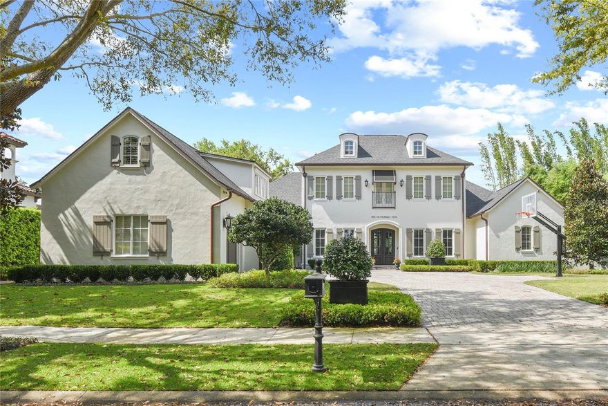 Stunning French Provincial Estate with modern features on large .36 acre lot.  5 Bedrooms, 6 Full Baths and almost 5,200 SF of luxury living space. Open and inviting with designated spaces. Formal living and dining rooms, downstairs master AND guest suite, home office, gourmet kitchen and family room, plus an upstairs flex/media room for movies, toys or hobby room. Flex room has its own stairway and includes full bathroom -could also be guest quarters. French doors along the living and family rooms open up to a beautiful outdoor living space, complete with an outdoor summer kitchen and heated, salt-water pool and spa. Signature Landscaping completed total front and backyard remodel. Manicured and private oasis including high end artificial turf for maintence free grass. Tons of room to run and play. Stunning Australian Pine floors throughout the downstairs complimented by high ceilings, crown moldings, and designer touches. The expansive kitchen is open to the family room and offers custom cabinetry, granite counters, walk-in pantry, large custom island, stainless steel appliances and gas cooktop, Wolf double wall oven, Wolf microwave, water softener. Master bedroom overlooks outdoor living and features an en-suite with double granite vanities, jetted tub, marble walk-in shower and large walk-in closet. Upstairs you’ll find 3 well-appointed bedrooms, 2 full baths, and a loft! Additional room perfect for home gym, craft/sewing room. Tons of finished storage! Oversized 3 car garage with even more storage.
Just a few of the new improvements that will be detailed in supplement-NEW roof, copper gutters, 2 AC condensers (4 total), 2 AC handlers(4 total), exterior paint, custom bar and island painting. Pool pump and water heater 2018-2019.
Located in one of Winter Park’s most sought-after neighborhoods, Windsong offers its residents Chain of Lake Access, community pools, splash park, pontoon boat, paddleboards. Top rated schools and minutes to Park Avenue shopping and dining.