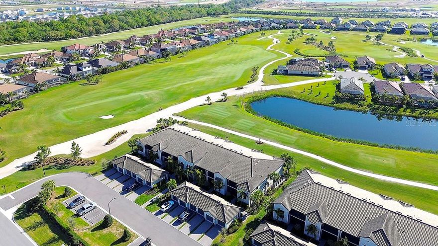 This may be the one you’ve been waiting for! TASTEFULLY DECORATED and meticulously maintained, this TURNKEY FURNISHED and "GOLF INCLUDED" top floor Veranda is MOVE-IN ready. Overlooking the 9th hole of the Piper course you’ll enjoy tranquil golf course and water views from this popular Bromelia II floor plan with 2 bedrooms 2 bathrooms, DEN and GARAGE. The OPEN FLOOR PLAN features HURRICANE RATED high impact windows and doors for your protection and peace of mind, upgraded light fixtures & ceiling fans, Ring doorbell, 2 generous screened lanais (one with new sunshade), new storage cabinets in laundry, vaulted ceilings, crown moldings and porcelain tile floors that extend to the screened lanai. The well-equipped MODERN KITCHEN is open to the living area and features quartz countertops, solid wood cabinets, S/S appliances, breakfast bar and central island perfect for entertaining. The DEN provides valuable bonus space that is flexible and adaptable to a variety of uses and is currently configured as a comfortable TV/Media room. It’s worth noting the current owners are the original owners occupying it only seasonally, non-smokers and do not own pets. LIVE WHERE YOU PLAY!! Located securely within the gates of LAKEWOOD NATIONAL GOLF & COUNTRY CLUB you’ll enjoy AMAZING AMENITIES that include DEEDED MEMBERSHIP in 2–18 hole Arnold Palmer championship golf courses, a grand clubhouse, a culinary center for fine dining, resort style swimming pool area with poolside café and Tiki Bar, heated satellite pools, eight lighted Har-Tru tennis courts, PICKLEBALL courts, two Har-Tru bocce courts, state-of-the-art fitness center with 24/7 access, full-service spa, fully maintained grounds and 24 hour security, all for a low monthly fee. Lakewood National also has a progressive rental policy with transferable memberships, popular with seasonal renters, if generating income is on your radar. It’s no wonder Lakewood Ranch is the #1 bestselling multi-generational master planned community in America with excellent schools, parks, bike trails, fine restaurants, abundant shopping and just a short drive to the area’s world-class beaches, theaters, galleries and so much more. TRULY A GOLFER’S DREAM!! LIVING IS EASY, CONVENIENT AND SECURE IN THIS ACTIVE LIFESTYLE COMMUNITY! A Seller approved inventory, and floor plan are attached to listing.